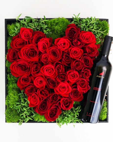 Heart Of Roses Crate-A heart of arranged roses is coupled with a bottle of justin Caberner Sauvignon-Wine and roses