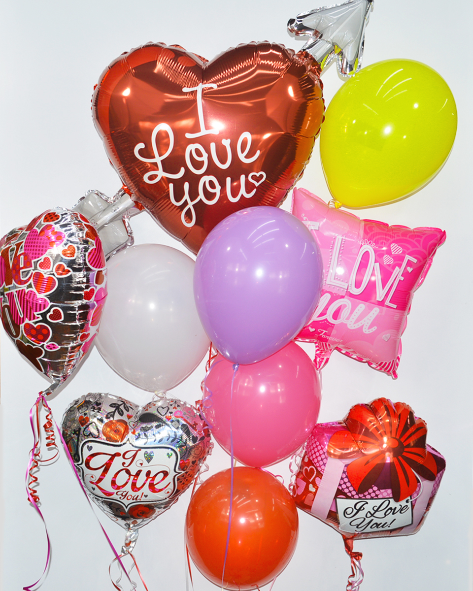 Love Balloon Bouquet Premium Assorted mylar and latex balloons are arranged into a balloon bouquet attached to a gift bag weight.