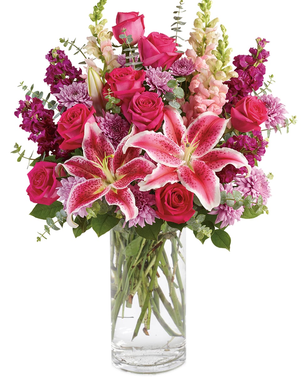 Scent of Spring Premium Scent of Spring - Bold and Beautiful, this stunning arrangement features pink roses, stargazer lilies, purple stock and more.
DELIVERY: Every order is hand-delivered direct to the recipient. These items will be delivered by us locally, or a qualified retail local florist.