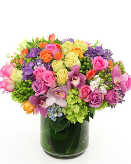 Spring extravaganza-This jaw-dropping arrangement is filled to the brim with bright Spring flowers including multiple varieties of hydrangea, multiple varieties of long stem roses and garden roses, spray roses, tulips, and more!-spring flowers