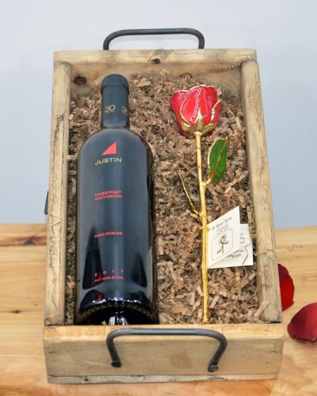 Wine and gold dipped red rose-Justin Cabernet Sauvignon is paired with a preserved Red Rose that is Dipped in Gold. gift crates
